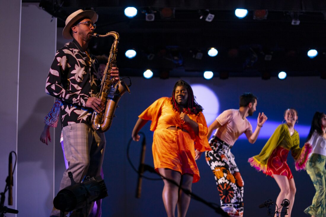 People dance on a stage