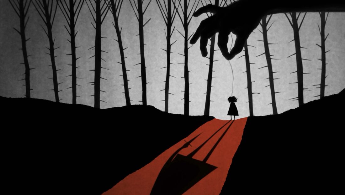 A shadow puppet of a girl stands in the woods