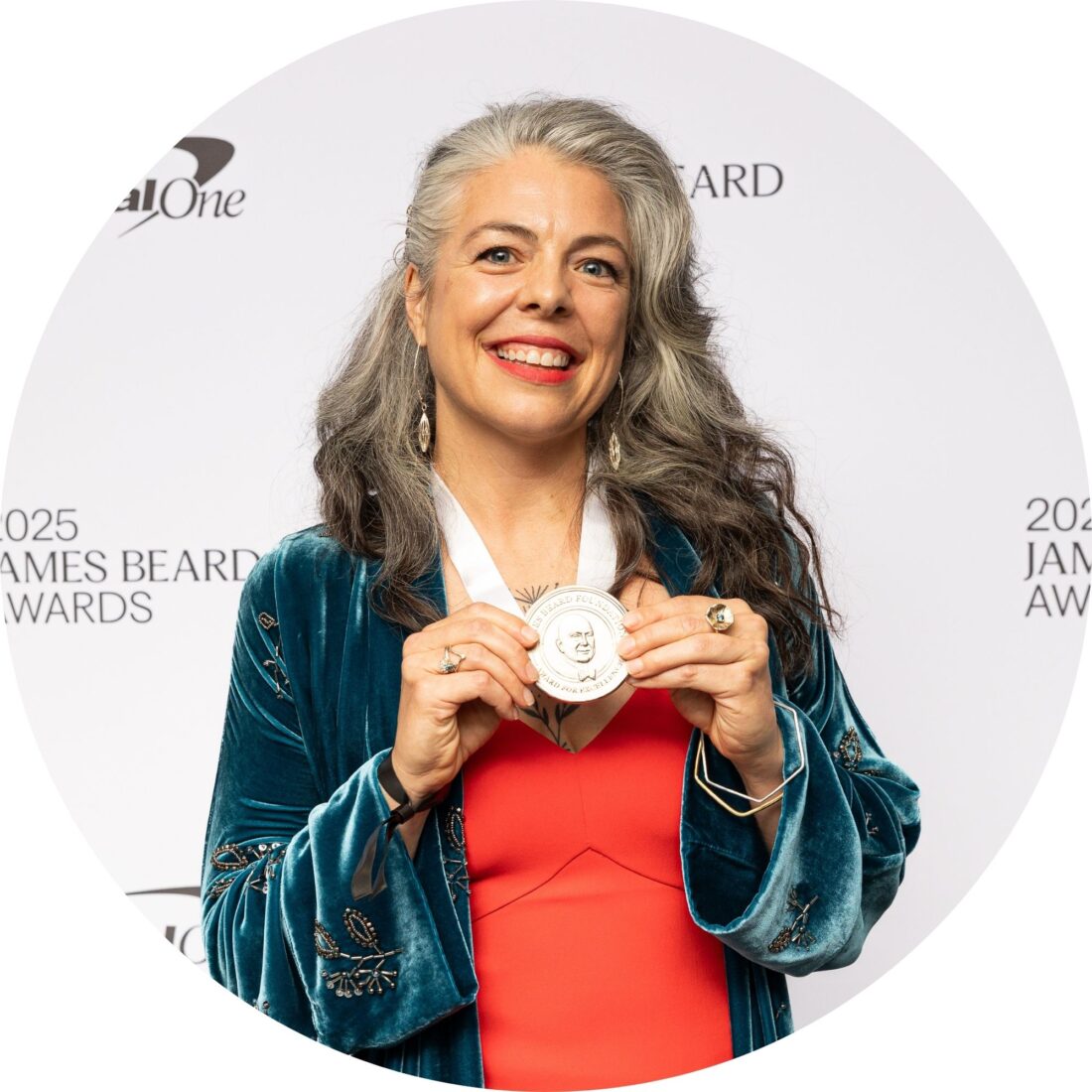 A portrait of a woman with a medal