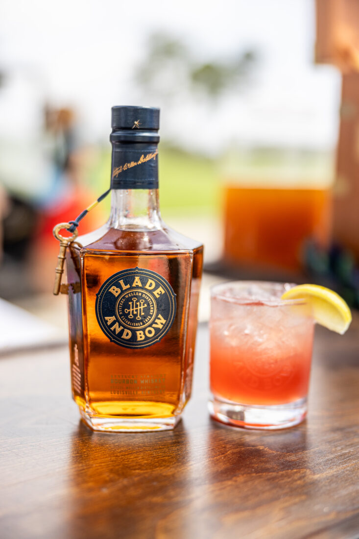 The Playing Through cocktail: Blade and Bow bourbon, grape juice, simple syrup, lemon juice, and ginger ale.