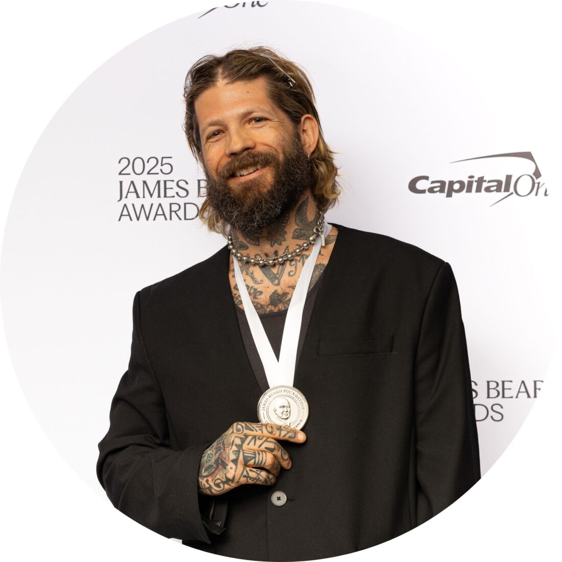 A portrait of a man with a medal