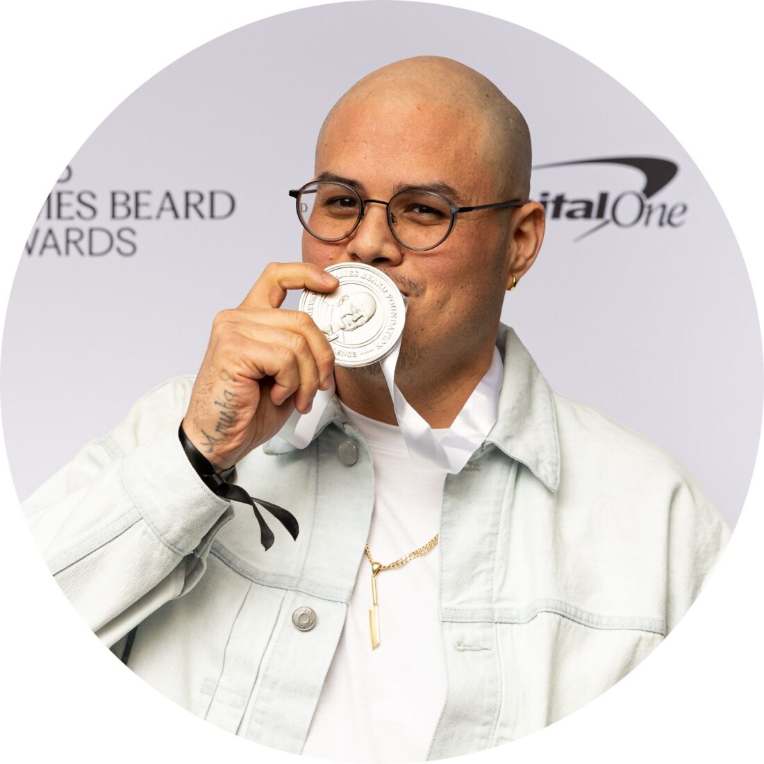A portrait of a man with a medal