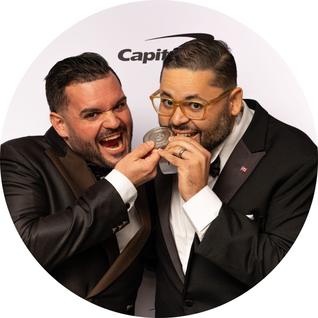 A portrait of two men with a medal