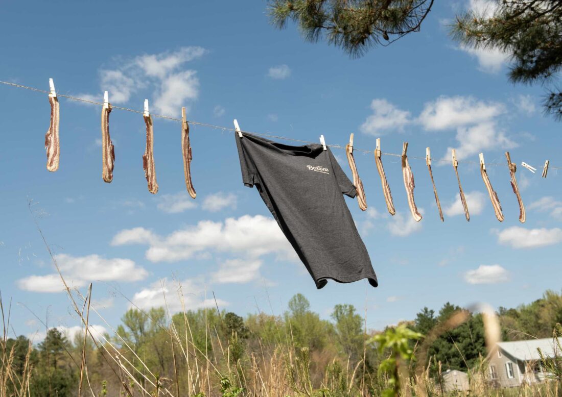 Bacon and a tee hang from a clothes line