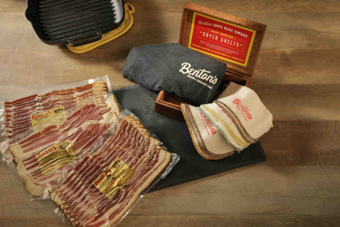 A pack of bacon with a shirt and dryer sheets