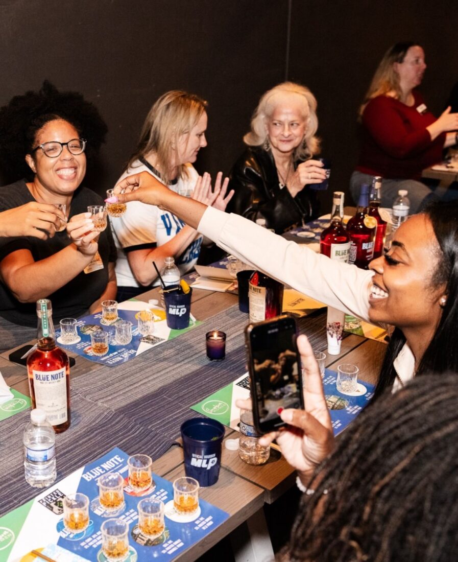 A table of women sample bourbon