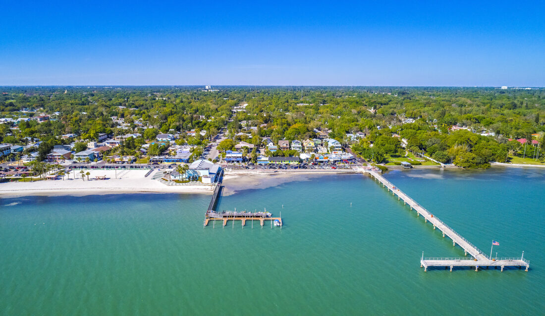 A coastal city with blue water