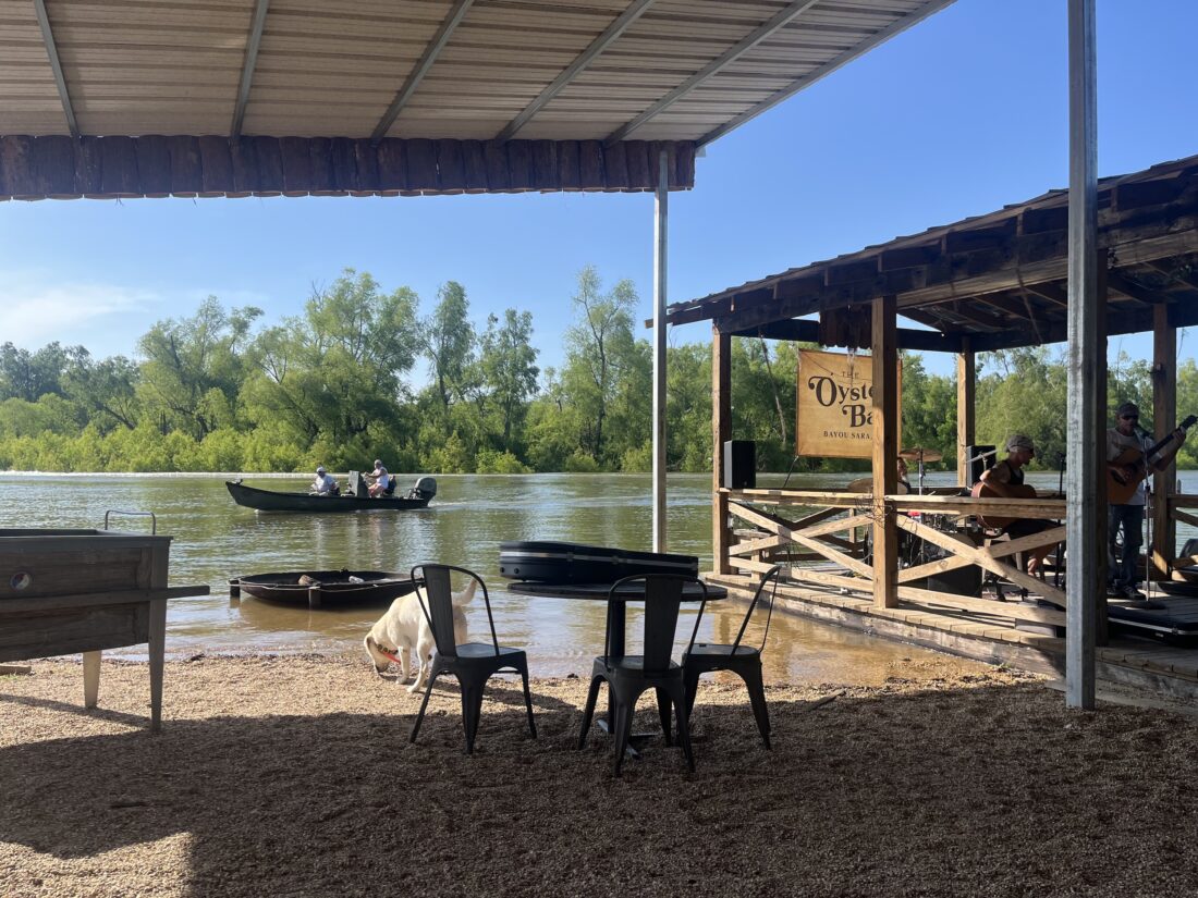 A bar set up on the banks of a river