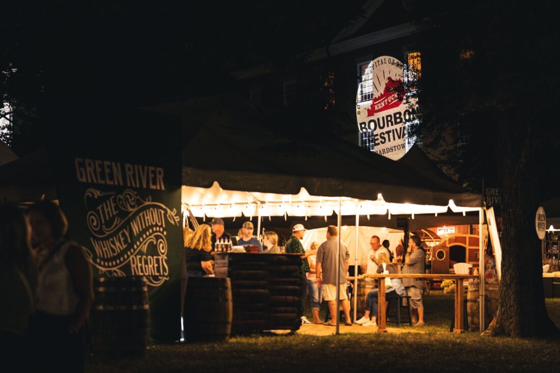 A tent at night at a festival