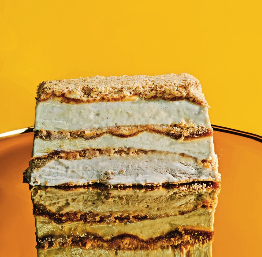 a slice of banana pudding semifreddo on a yellow backdrop