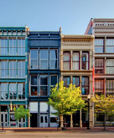A street view of multicolor building in downtown Louisville