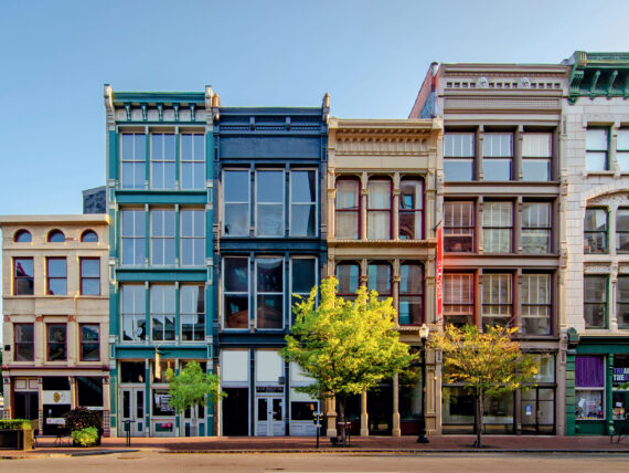 A street view of multicolor building in downtown Louisville