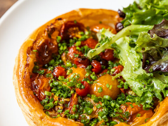 A tomato tart on a plate