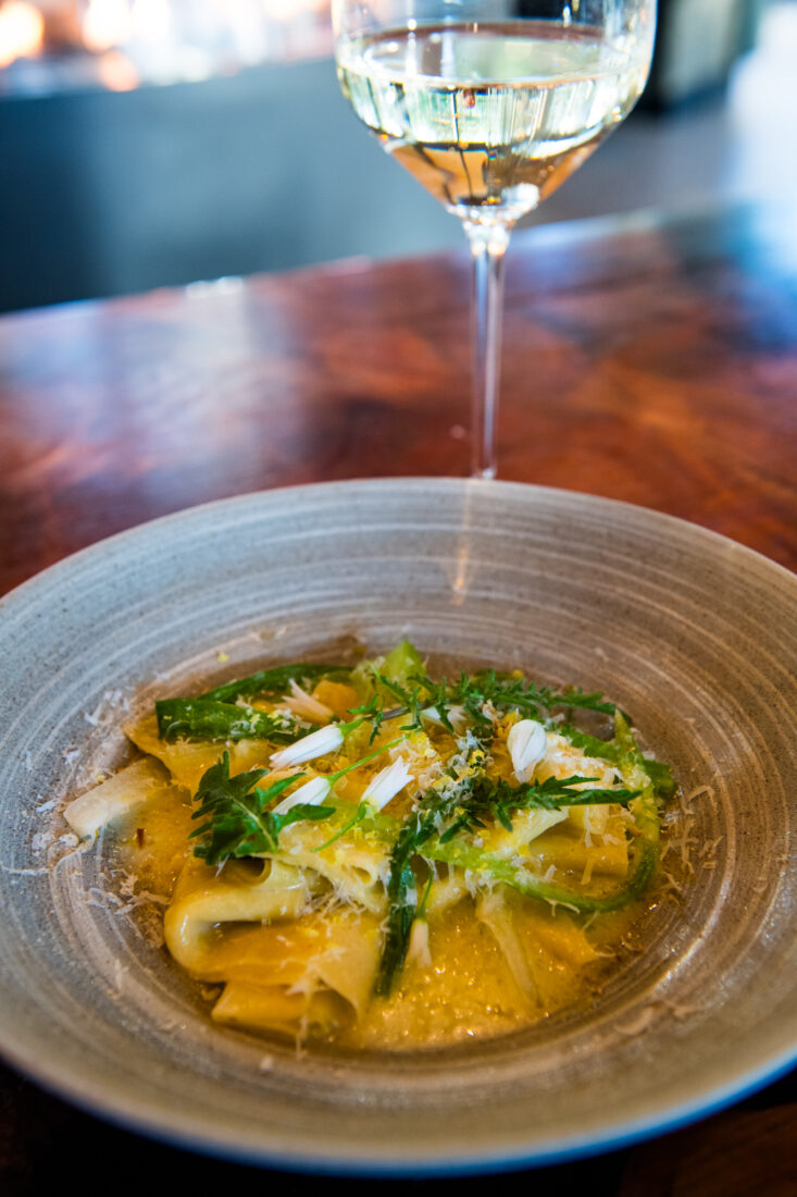 Tagliatelle and spring onion in a dish