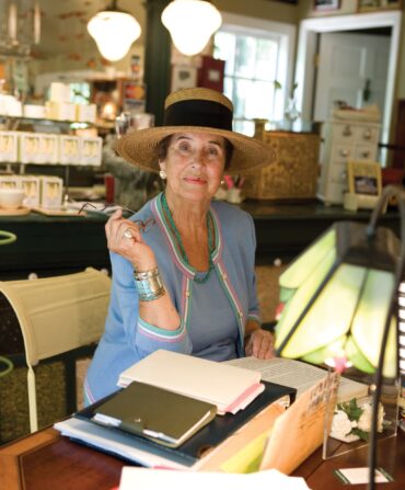 A portrait of a woman with a hat