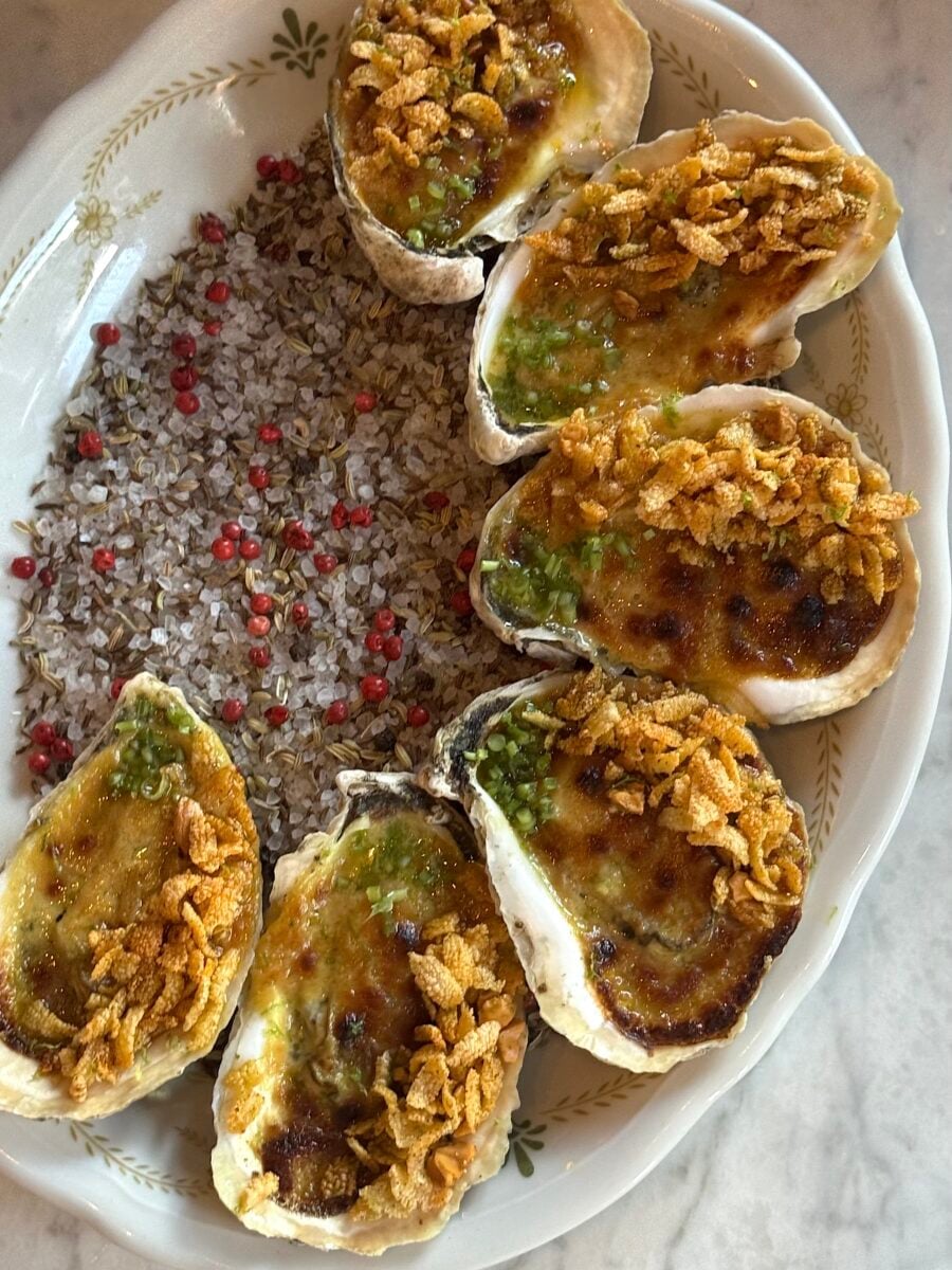 grilled oysters with crab curry and cashews