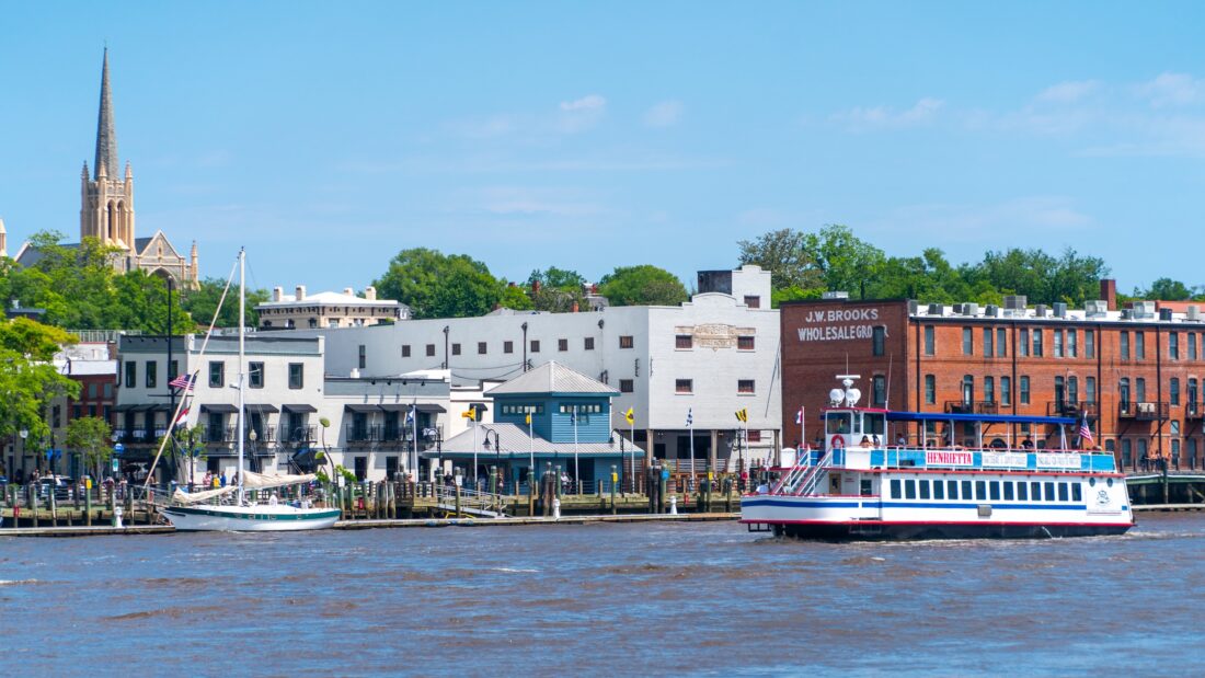 downtown wilmington with a boat on the Cape Fear River