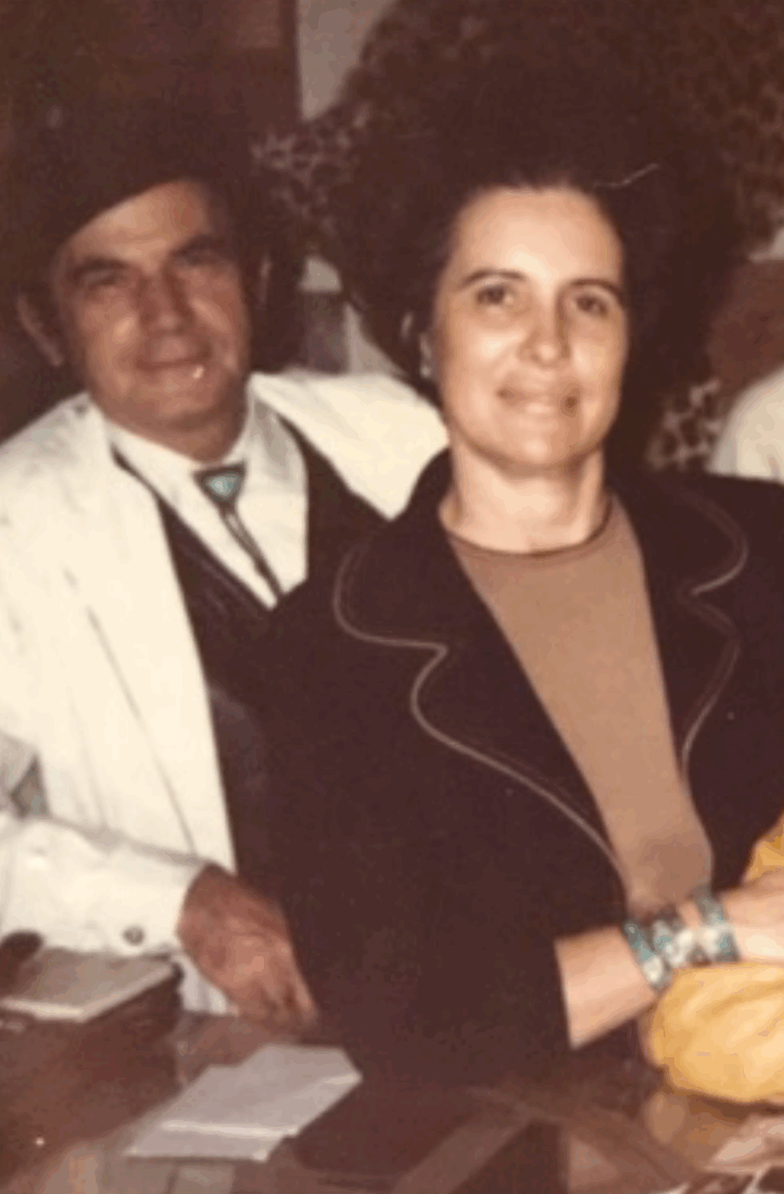 An old photo of a portrait of a man and woman
