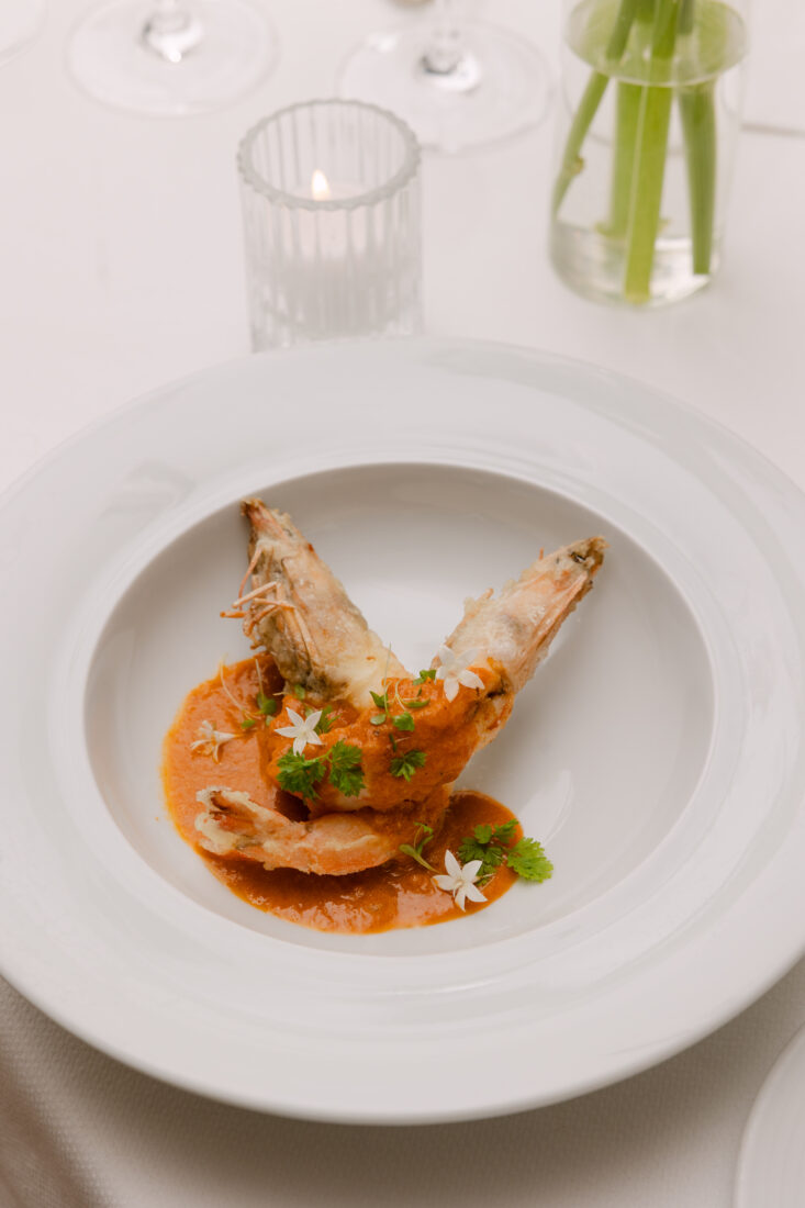 The second course: grilled shrimp with a coconut curry sauce.