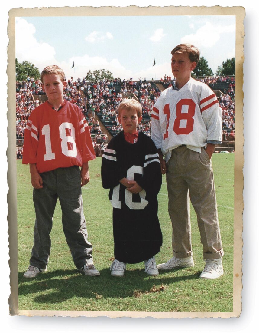 Peyton, Eli, and Cooper Manning sport their father’s number in Oxford, Mississippi.