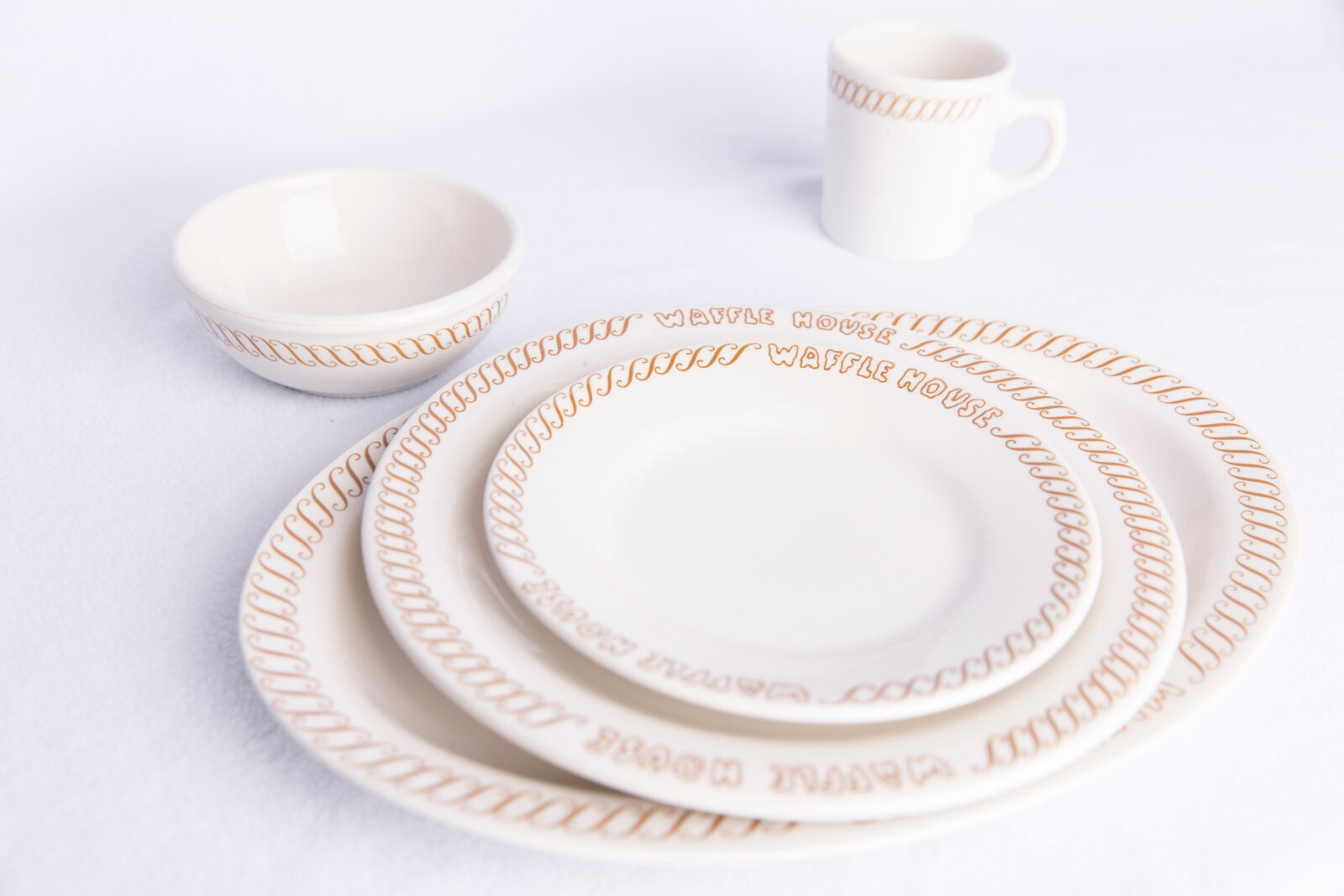 A set of plates and mugs