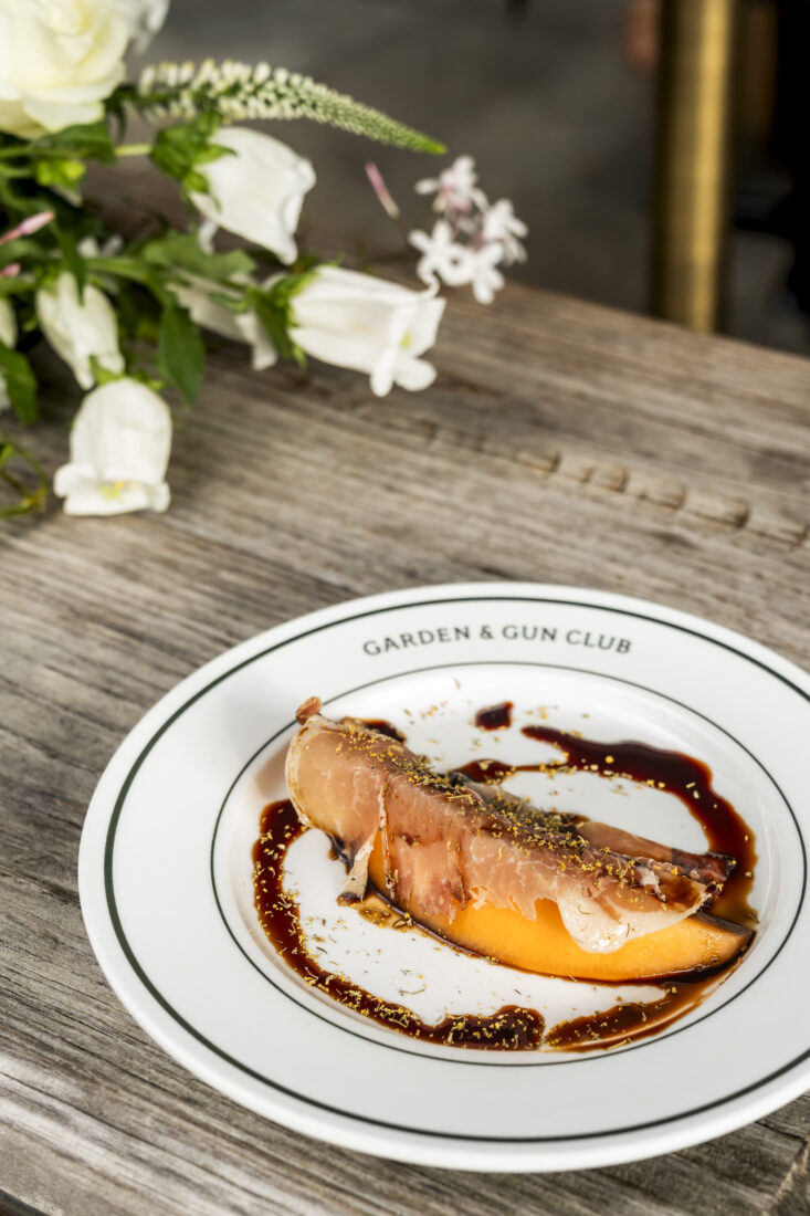 The amuse bouche: 24-month aged country ham, melon, saba, and fennel pollen.