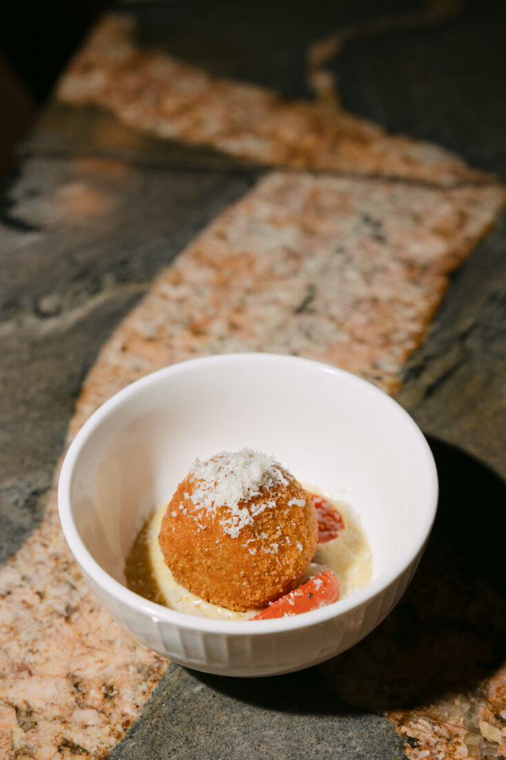 The first course: country ham arancini with mornay sauce and grana padano—chef McGarity’s twist on the Kentucky Hot Brown.