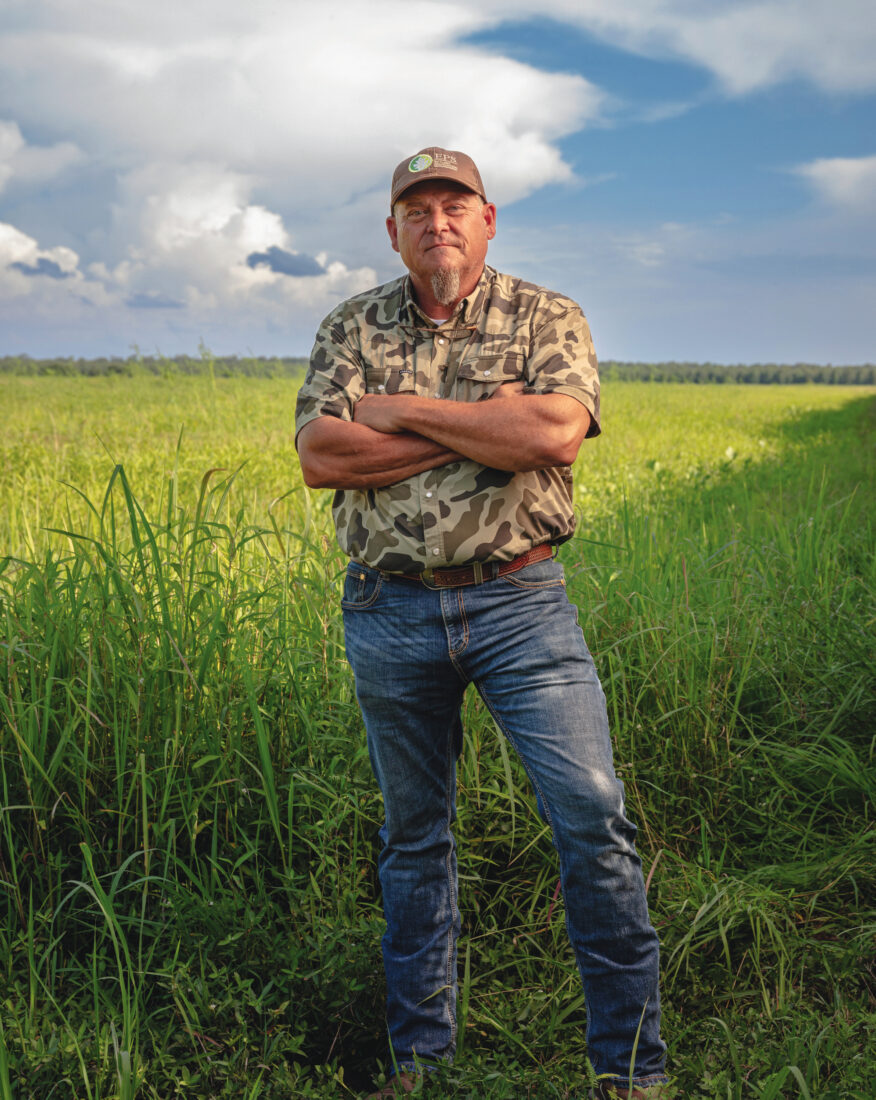 A man stands in a field