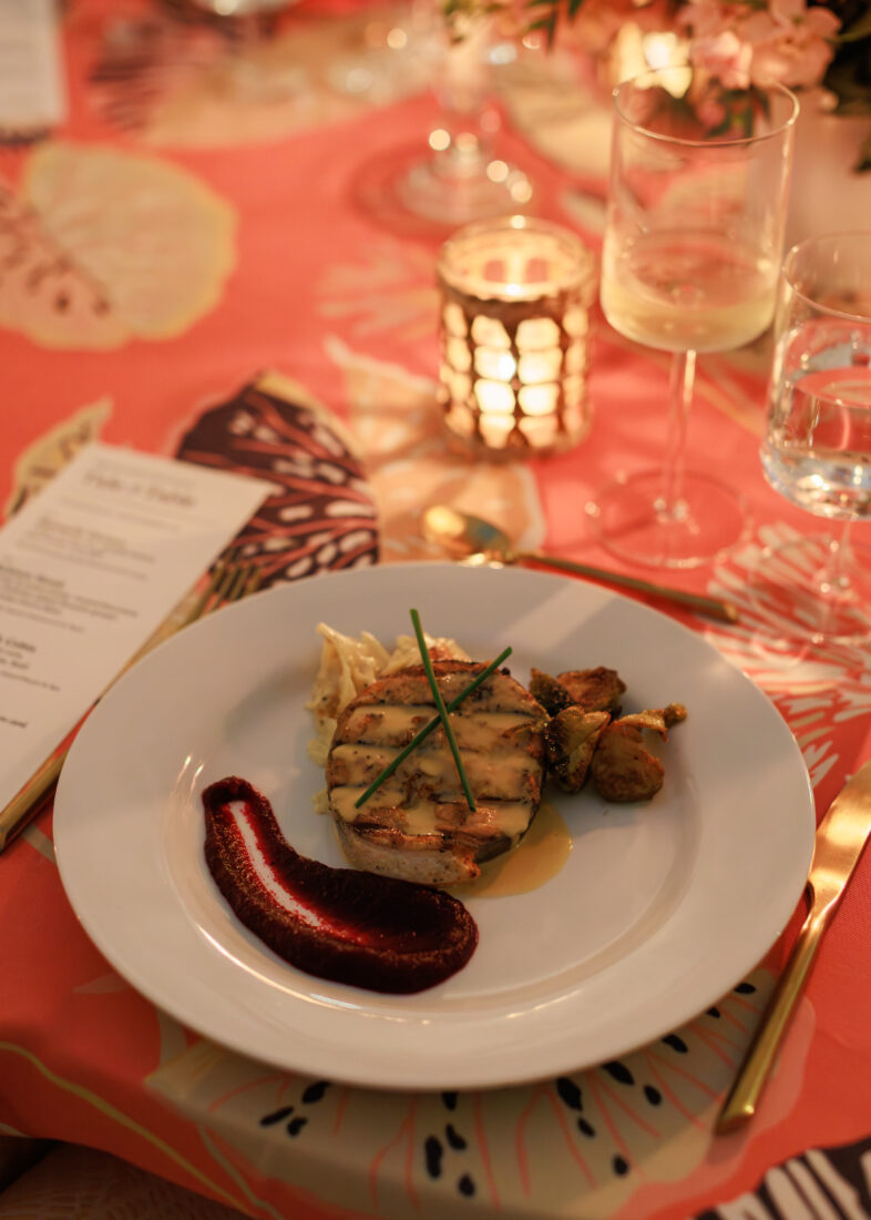 The second course: Salmon steak with parsnip and potato gratin, honey balsamic glazed brussels sprouts, roasted beet puree, and blood orange beurre blanc.