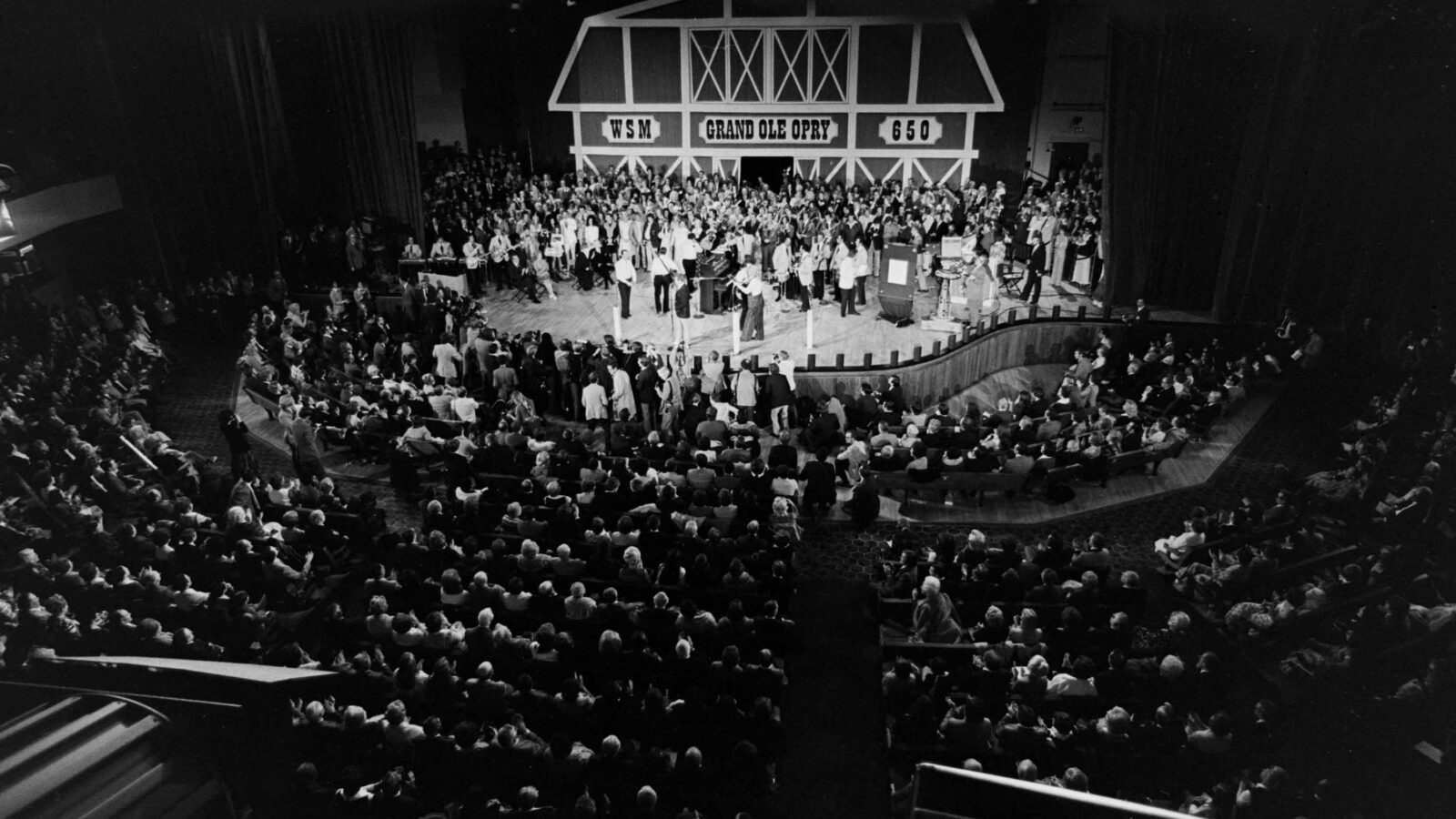 People on stage at the Grand Ole Opry