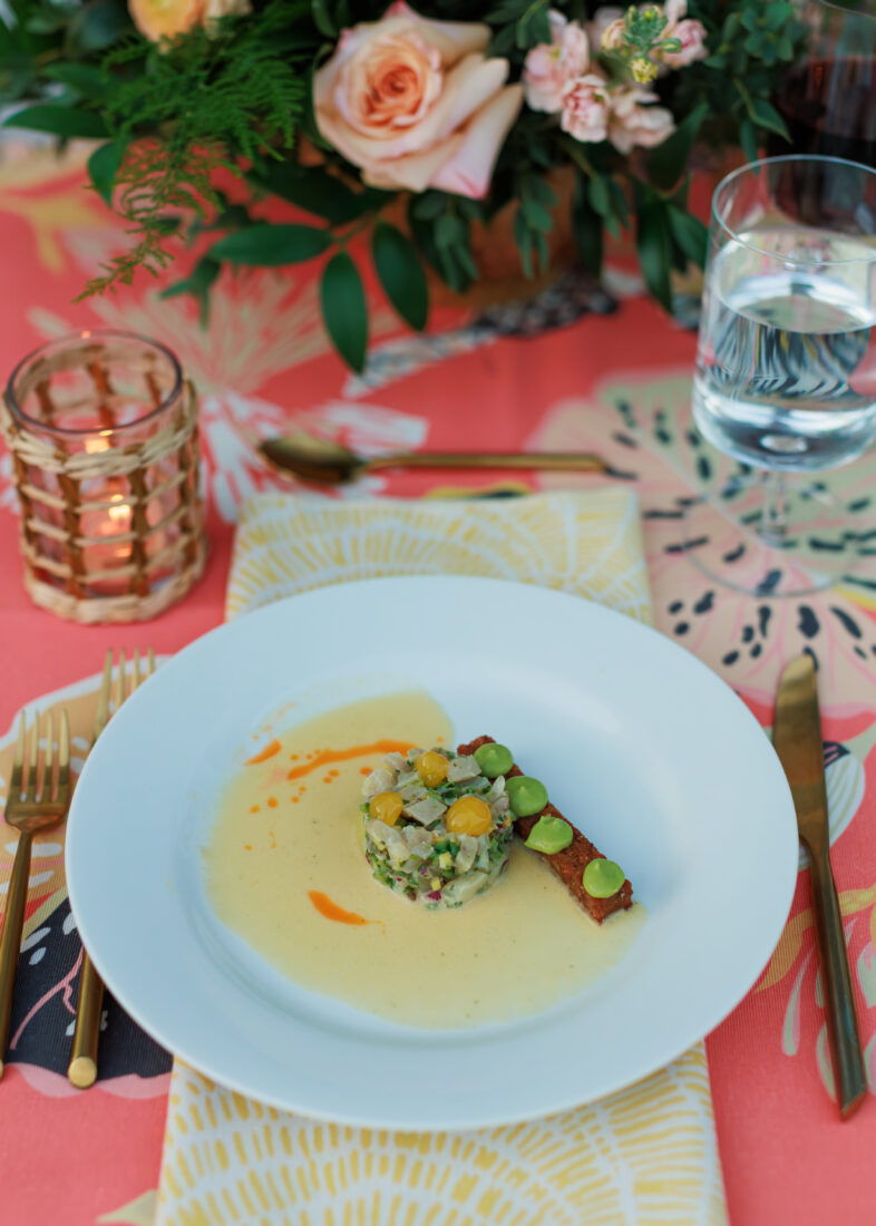 The first course: Hamachi tartare with crispy coconut rice, green mango leche tigre, and avocado mousse.