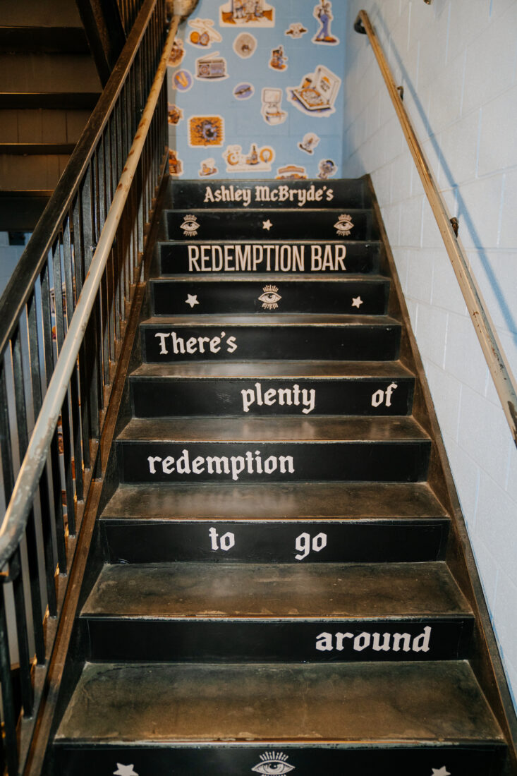 Steps with hand painted lettering to Redemption Bar