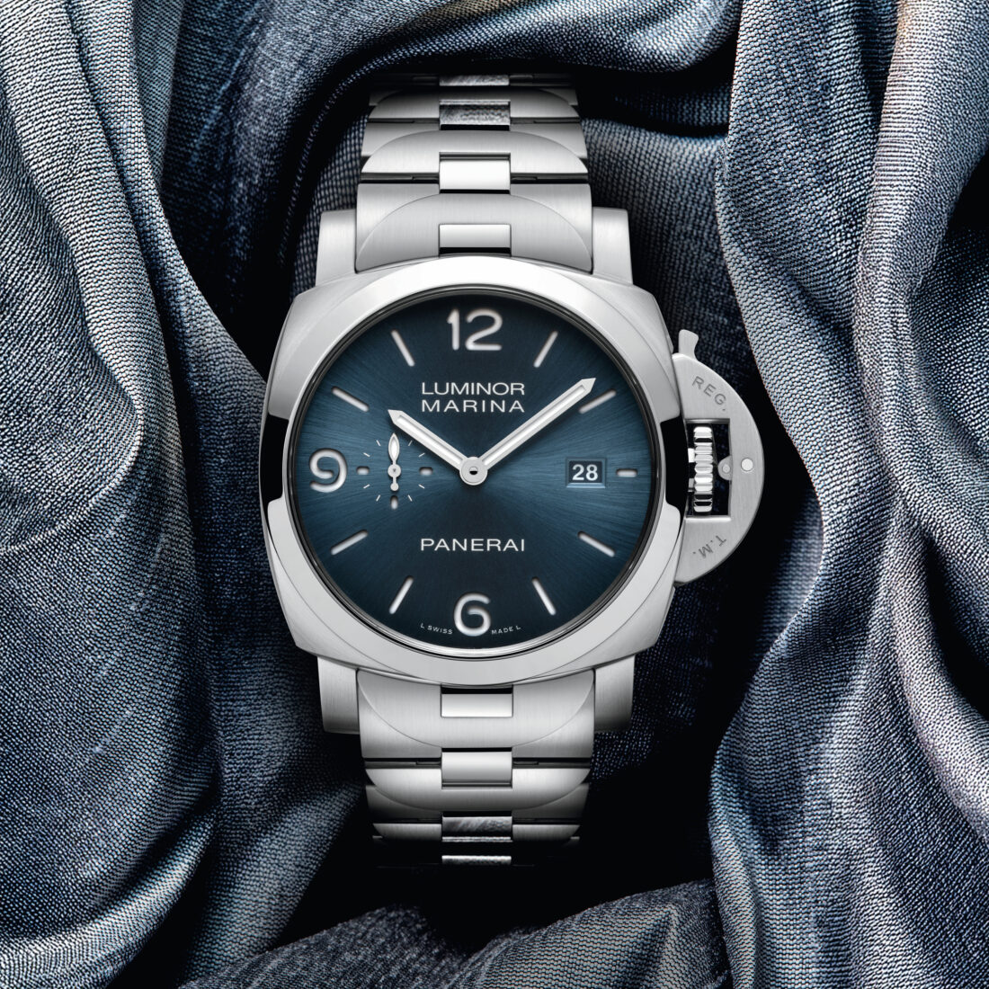A watch with a dark blue face