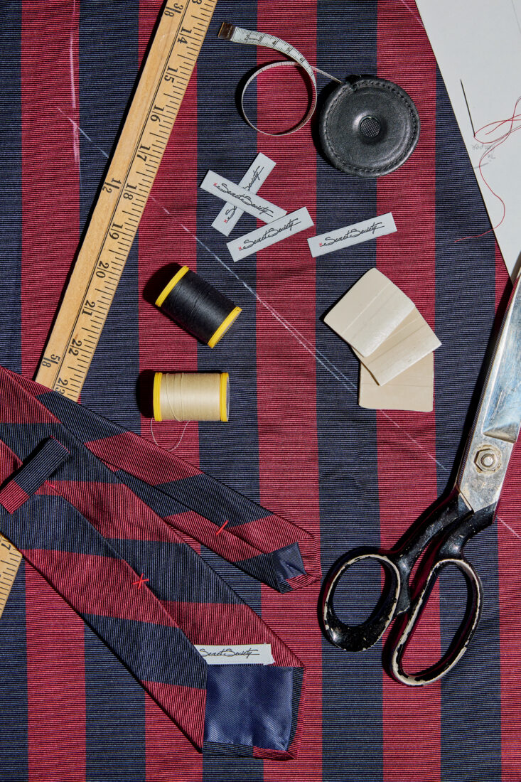 The makings of a navy and red tie