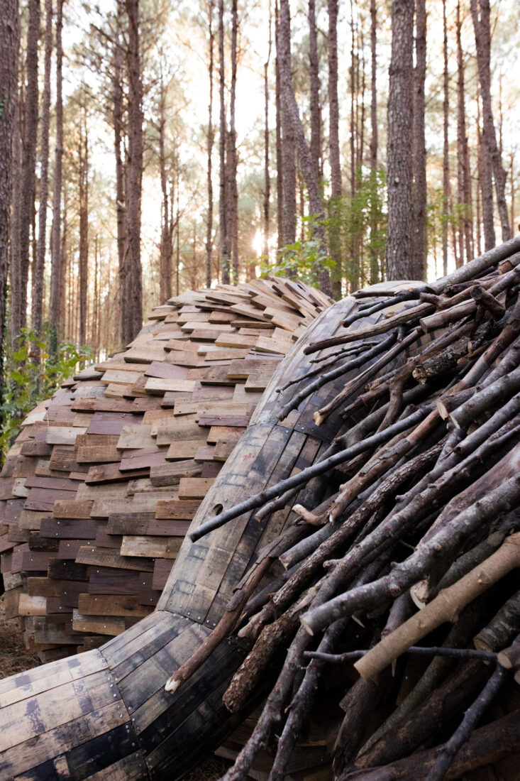A detail of a troll with recycled wood