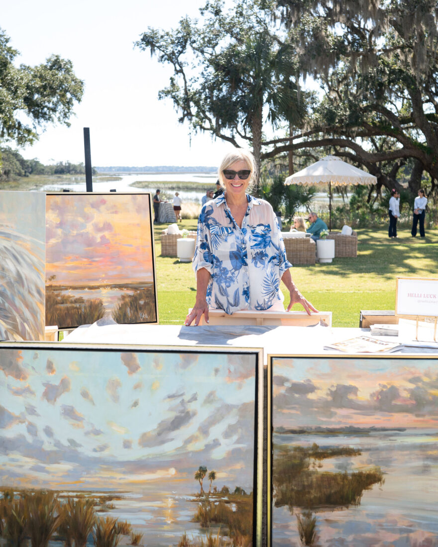 Helli Luck, with her original artwork.