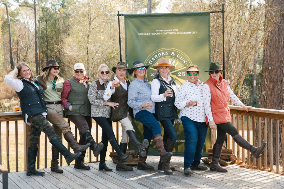 The GRITS—“Girls Really Into Shooting”—celebrate a successful afternoon on the course.