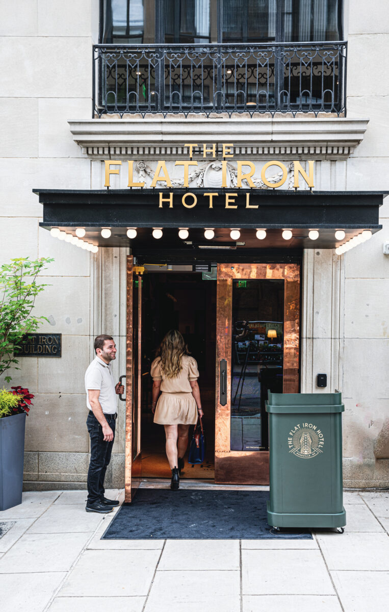 A woman walks into a hotel door