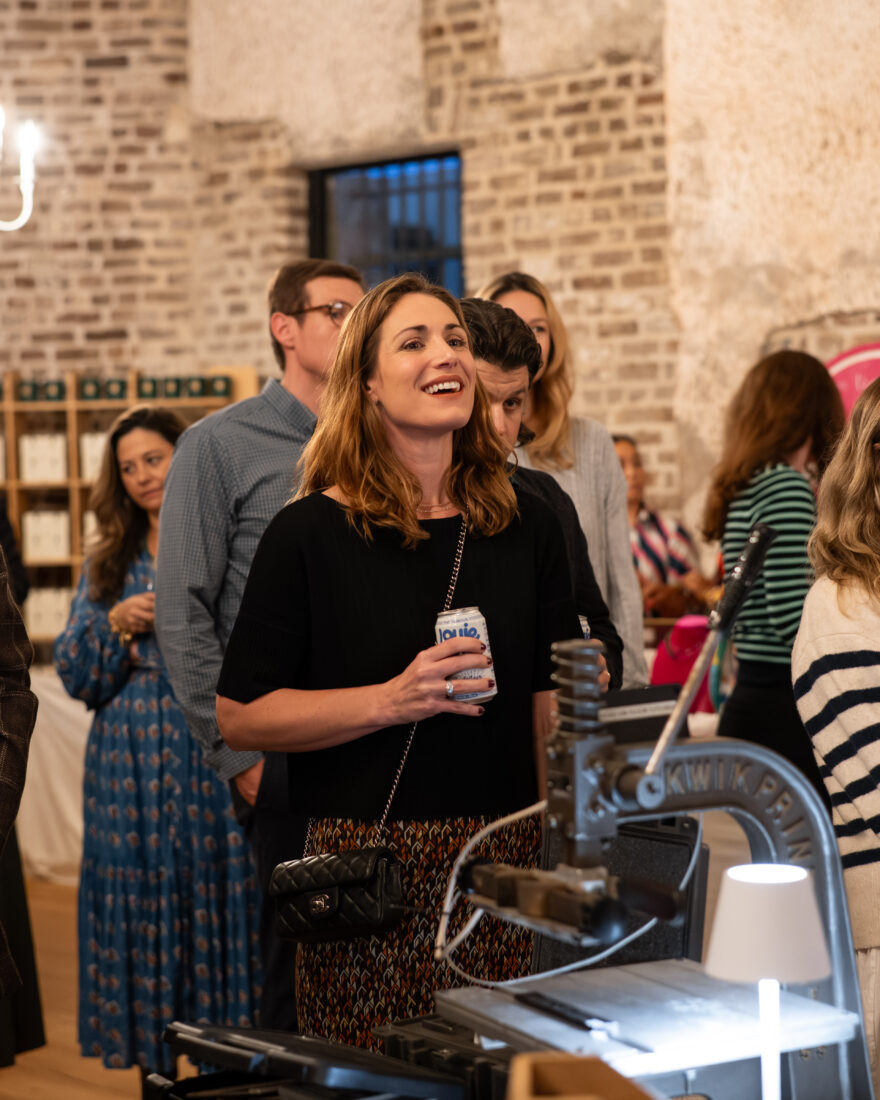 Michelle Terrebonne Becker of Louie Louie, a drink category runner up in the 2025 Made in the South Awards for the Blackberry Lemon THC Seltzer, browses the vendors.
