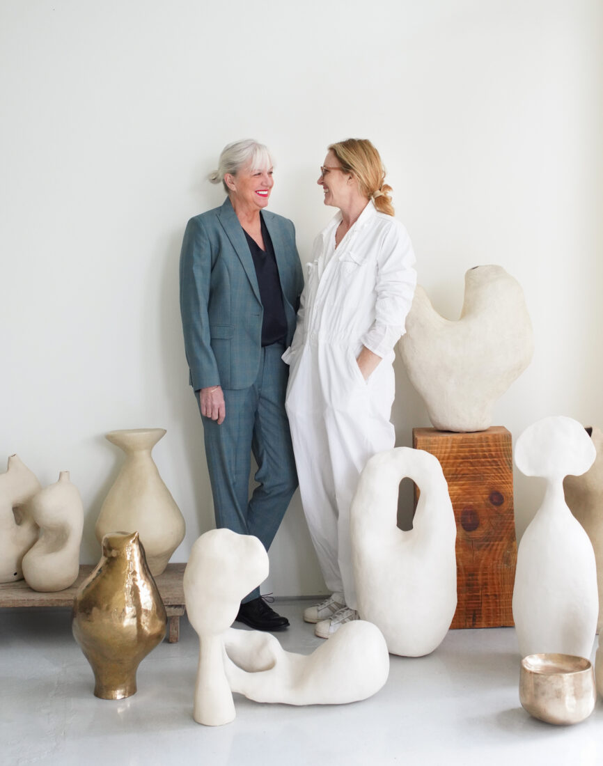 A portrait of two women in white gallery