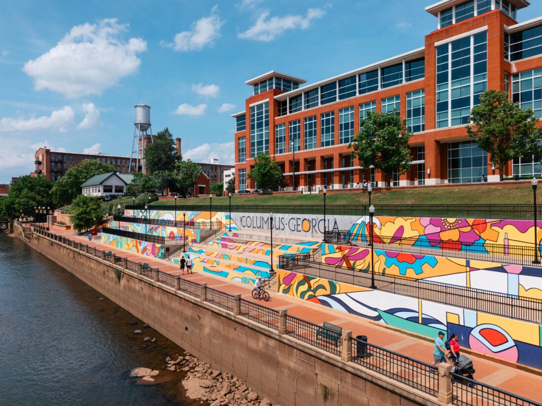 A mural alongside a river walk