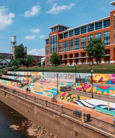 A mural alongside a river walk