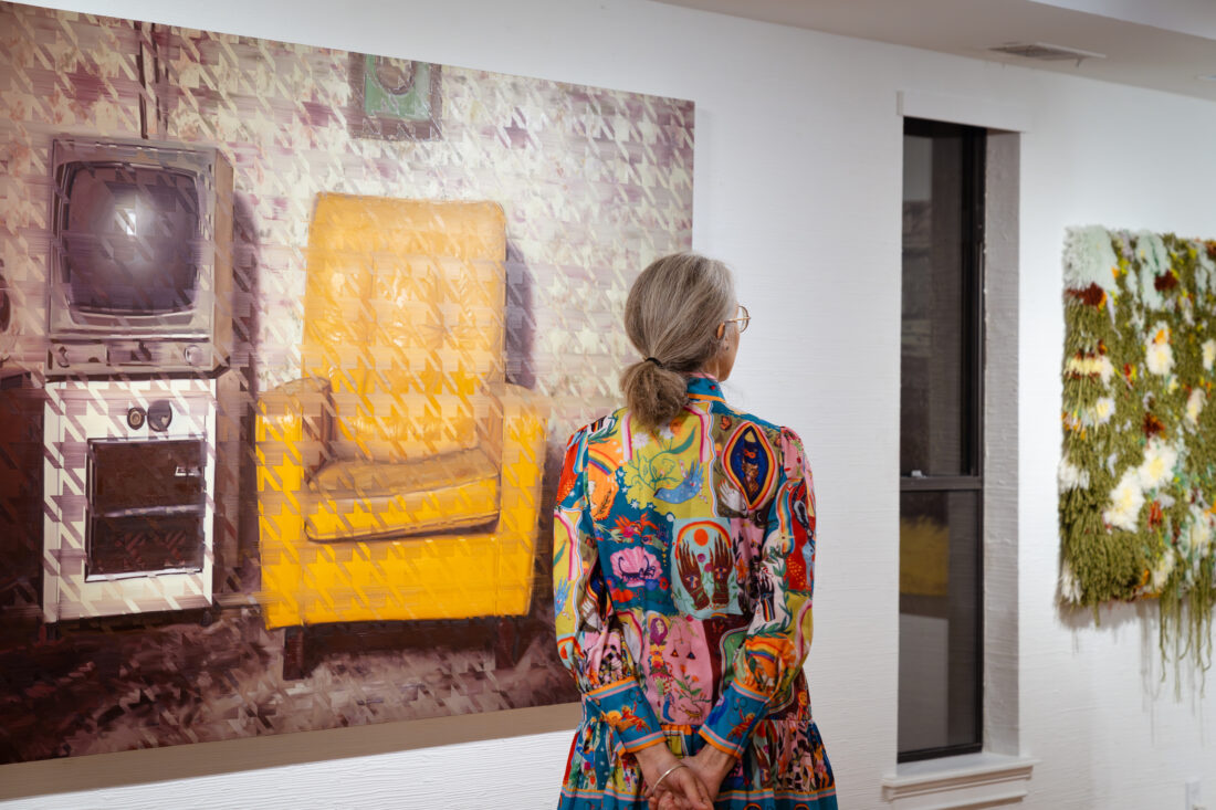 A woman in an art gallery