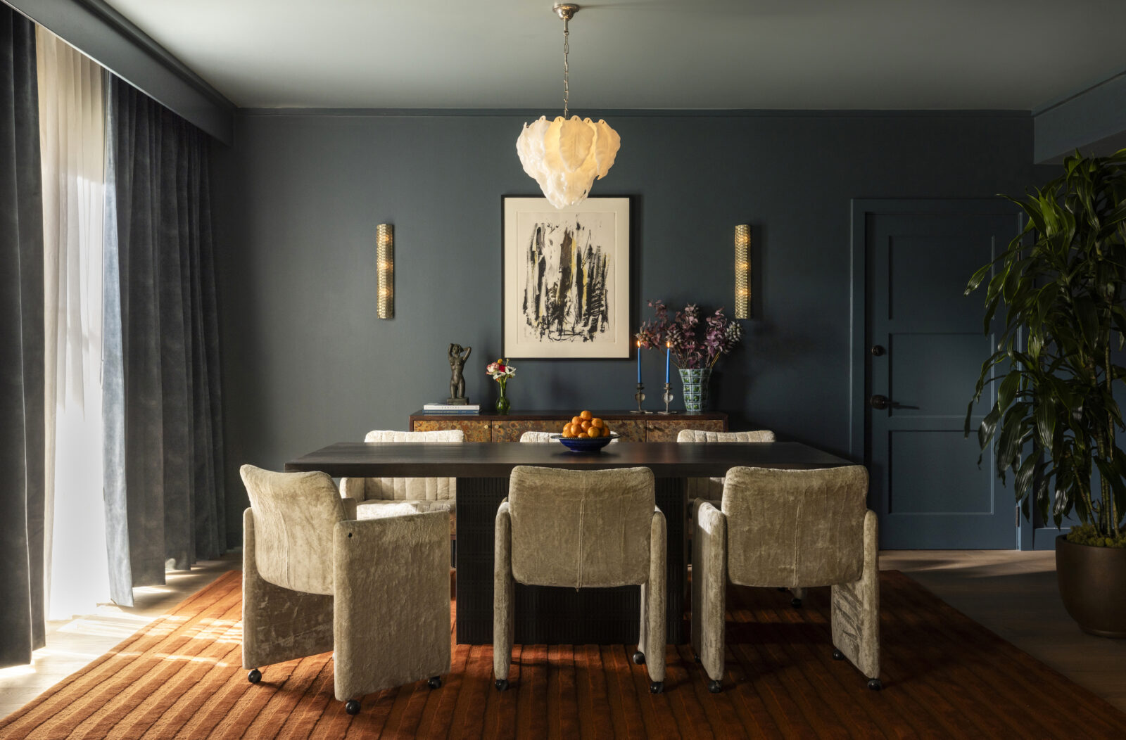 A hotel dining room with velvet seats