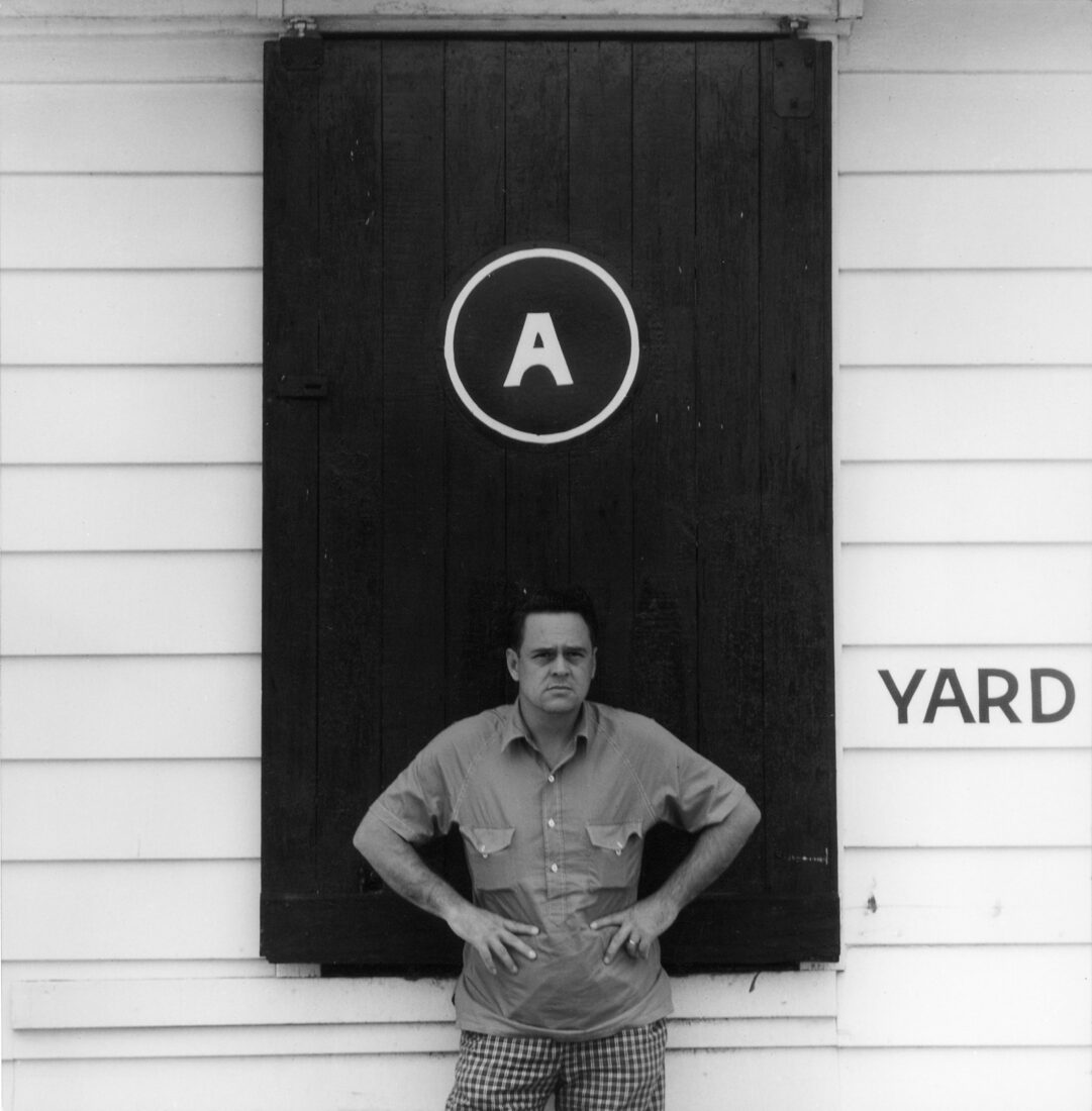 A black and white portrait of a man