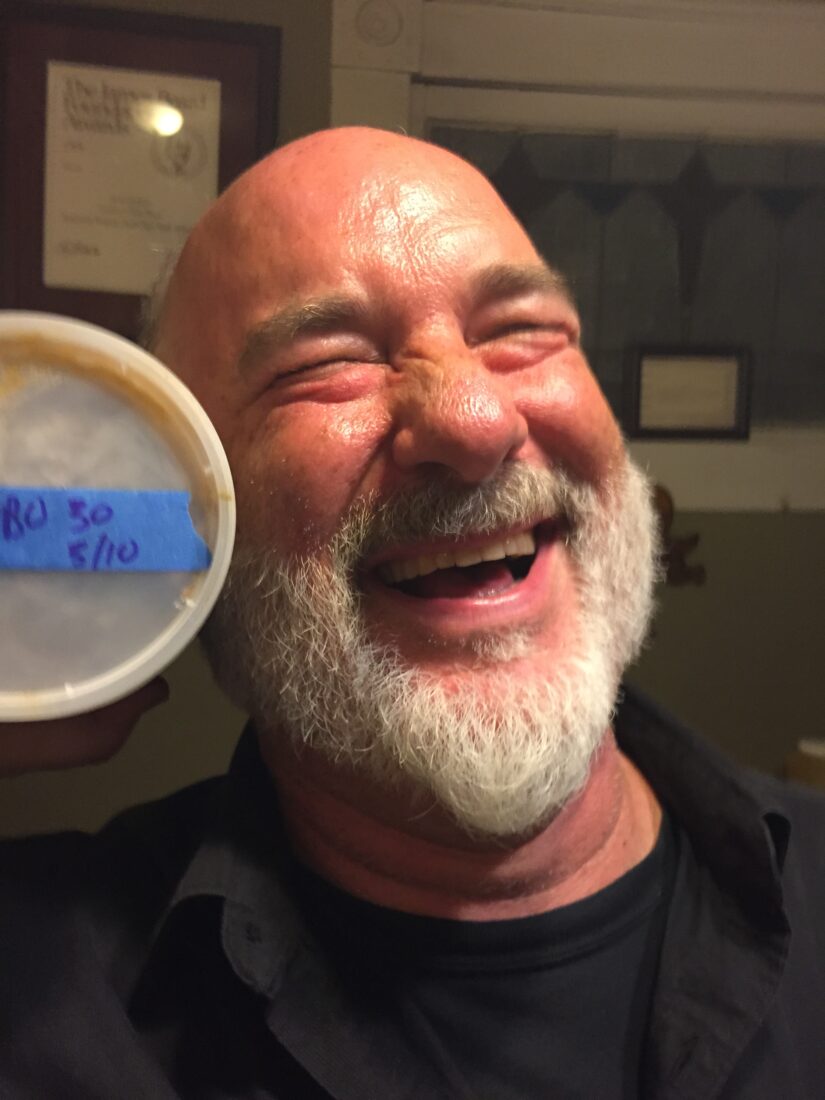 A portrait of a man with a tub of gumbo