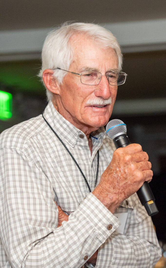 A man holds a microphone