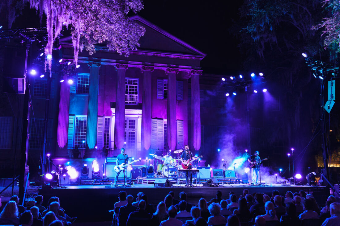 A band performs on a stage