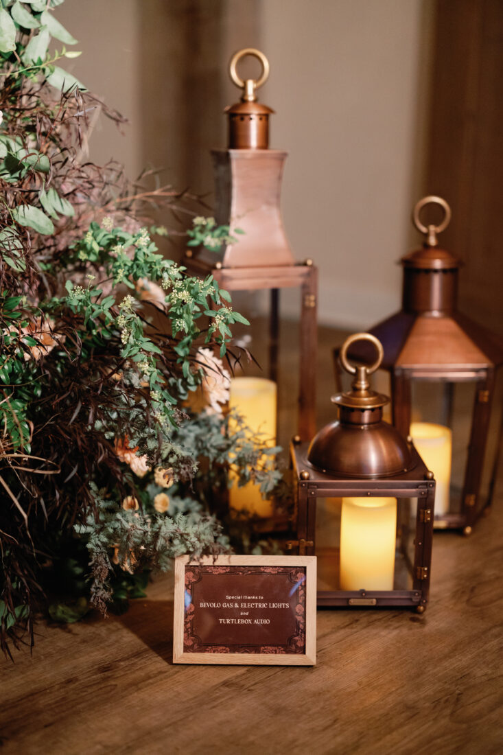  Lanterns from Bevolo Gas & Electric Lights illuminate the space.