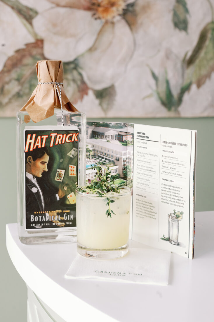 The Thyme Honored cocktail created by The Cooper Hotel, composed of High Wire Distilling Co. Hat Trick Gin, Chareau liquor, lemon cucumber thyme syrup, and lemon juice.